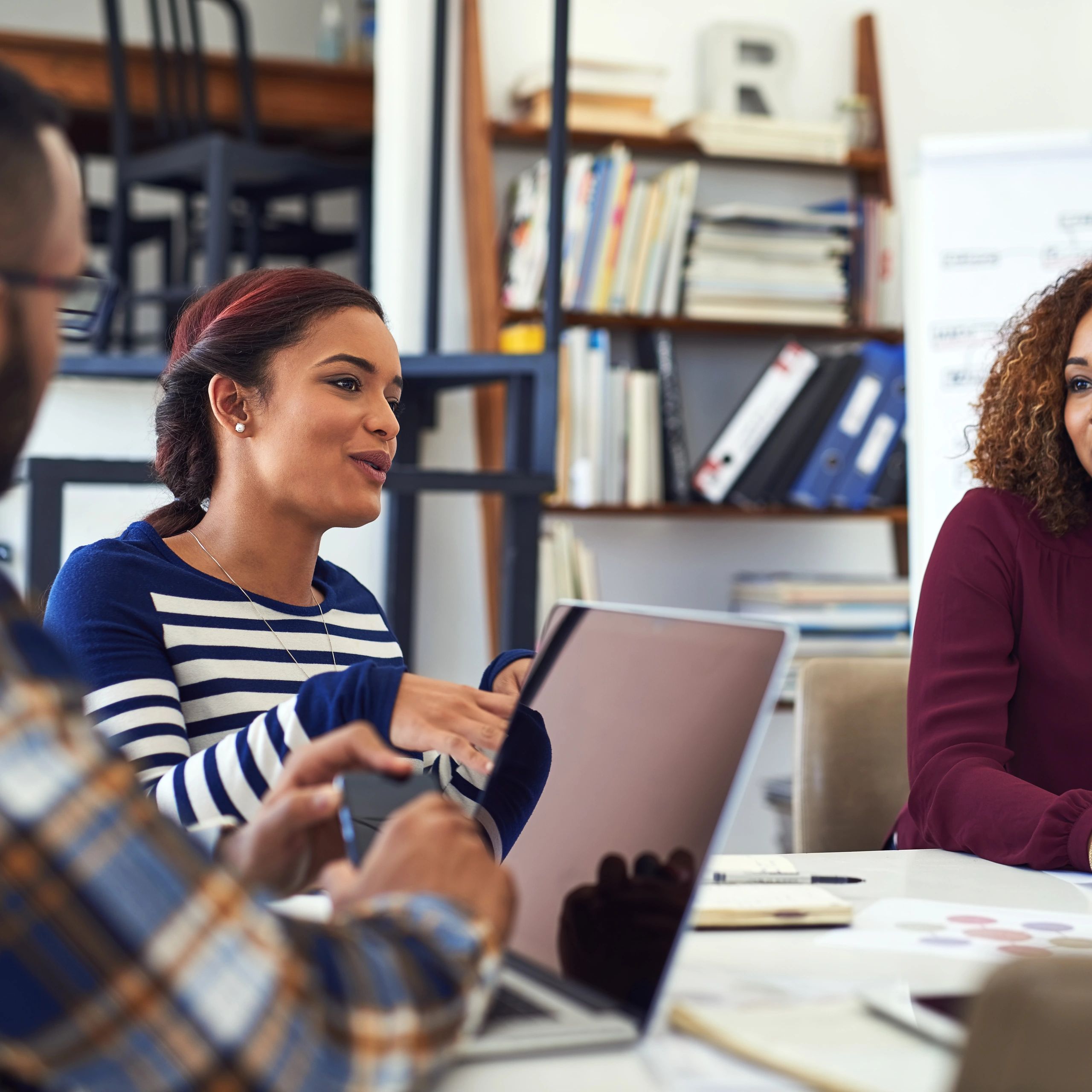Team member in an office brainstorming session
